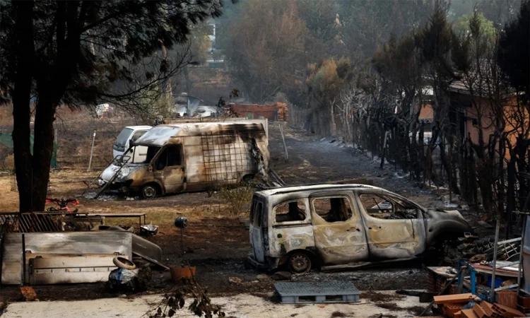 Spanish firefighters battle new blaze front as 15,000 evacuated